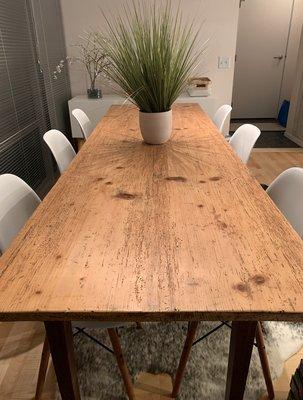 This table had been originally a mustard-color wood effect and we took it down to the original pine. Love it!