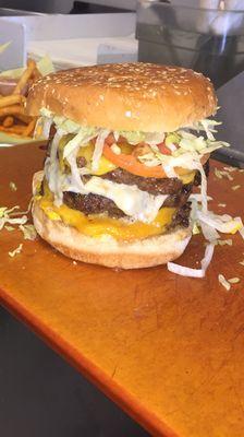 Look at this yummy triple cheeseburger!