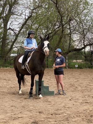 Peyton and Scooter being coached by Madison