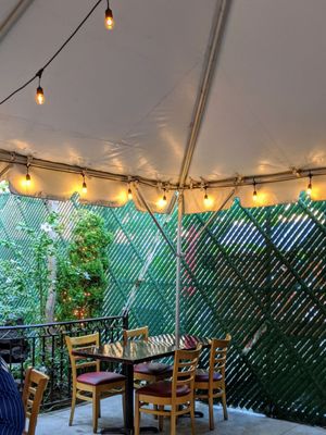 Tented outdoor dining (back of the restaurant)