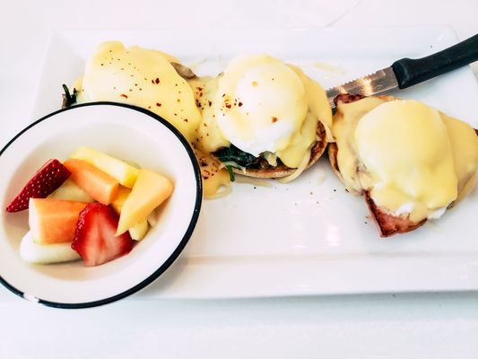 Benedict flight with fruit cup