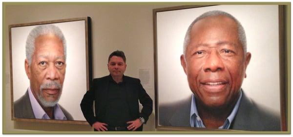 Rossin poses with "MORGAN" and "HANK" in The Smithsonian National Portrait Gallery. His painting of revered American icon, Morgan Freeman,