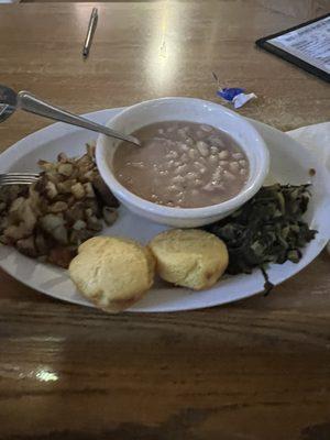 Ham and beans dinner with greens, corn bread, and fried potatoes