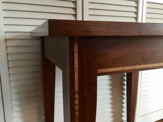 Walnut end table inlaid with tiger maple