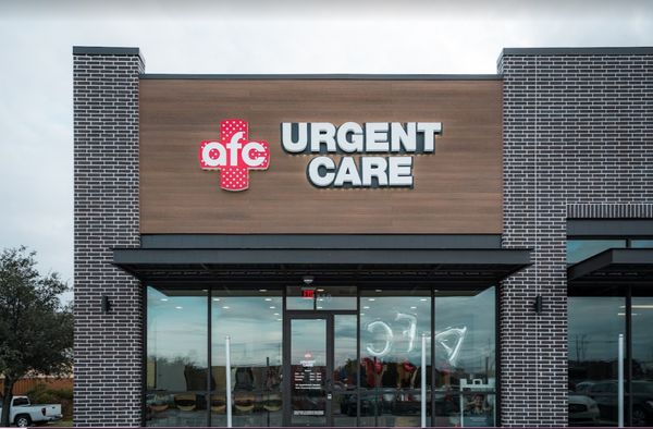 Exterior photo of AFC Urgent Care Allen on the grand opening day.