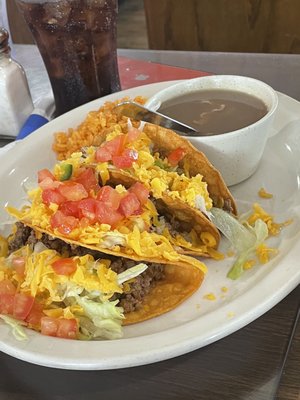 Three ground beef tacos served with Charro beans and rice. YUMMY!