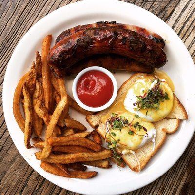 Brunch - Sausage[s] & Perfectly Poached Eggs with Classic Fries. Served every Sat/Sun from 11:00am - 3:30pm.