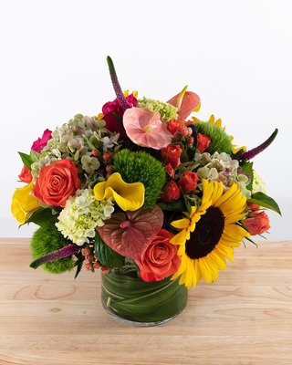 Hazy Noon - this beautiful assortment of hydrangea, sunflowers, roses, anthurium, calla lilies, and dianthus is a gorgeous hazy sunset