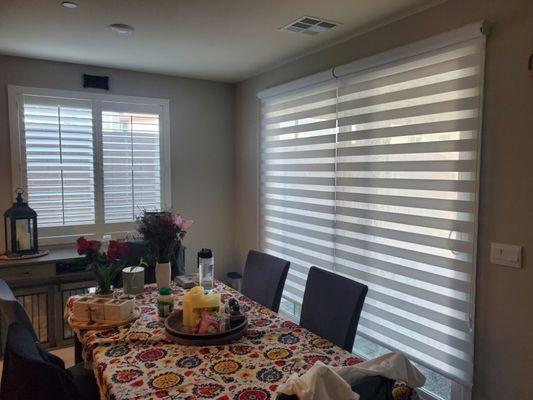 zebra Roller shades on sliding doors 
and 1 window with Shutters 
perfect design.