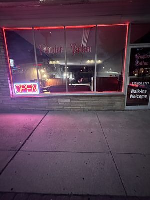 Outside picture of Premier Tattoo & a look inside