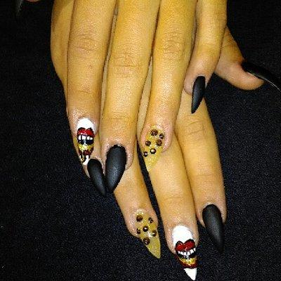 Nails with lips free style www.houseofextensionslasvegasnv.com  has the best nail techs..