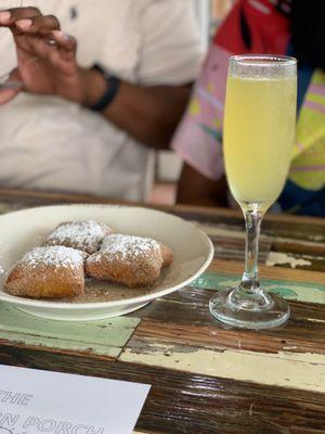 Beignets and pineapple mimosas