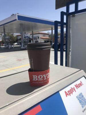 Boyd covfefe(1.50) in front of gas pumps