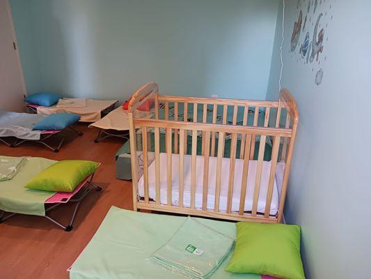 Mane Daycare features a serene sleeping room where children can rest comfortably and peacefully.