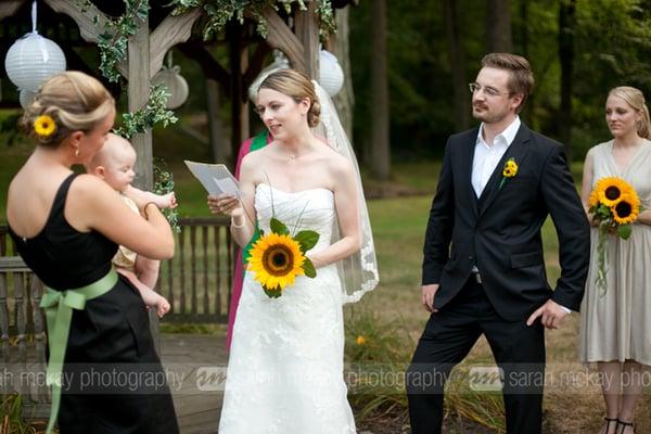 Bride with one large perfect Sunflower for her bouquet.