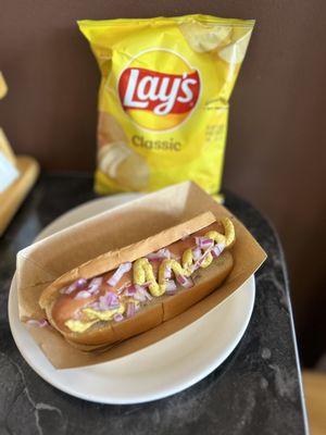 Hot dog with onions and spicy mustard