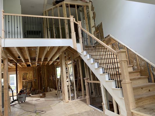 Oak handrails with poplar skirt boards.