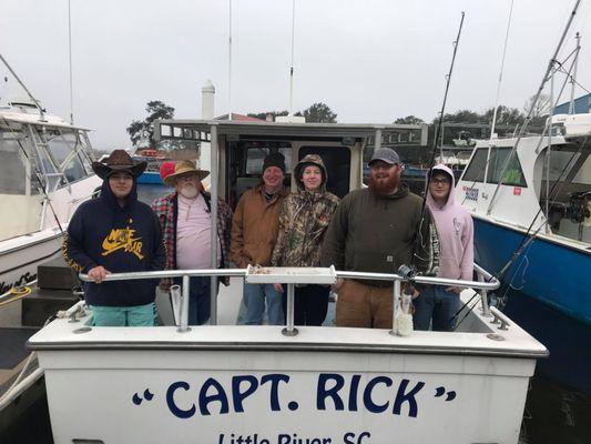 Me and five of my coworkers setting out to catch a bunch of fish.