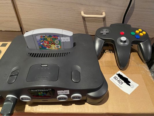 Nintendo 64w/Cables, SuperMario64, and a controller