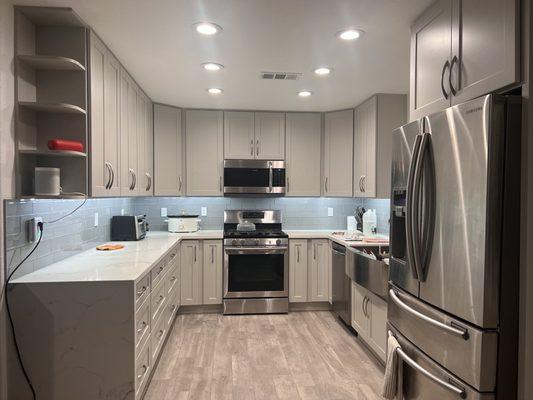 Whole kitchen remodel: new cabinets, countertops, backsplash.