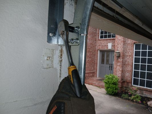 Garage door rails bent repair around Farmersville Princeton area