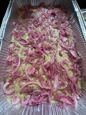 Mangu (mashed plantains) seasoned with marinated onions and their special touch!