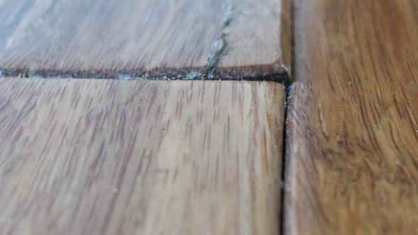 New Bamboo Flooring Damaged, Glued, Poorly Fitted