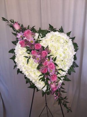 Fresh flower solid heart standing spray .