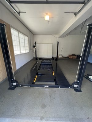 Stack those cars and save space! 
 Atlas 4 Post Car Lift