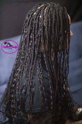 Boho messy goddess box braids.