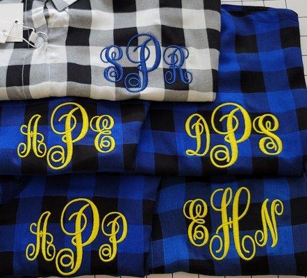 Monogram embroidered on shirts.