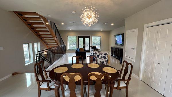 Large dining and living areas with porcelain tile.