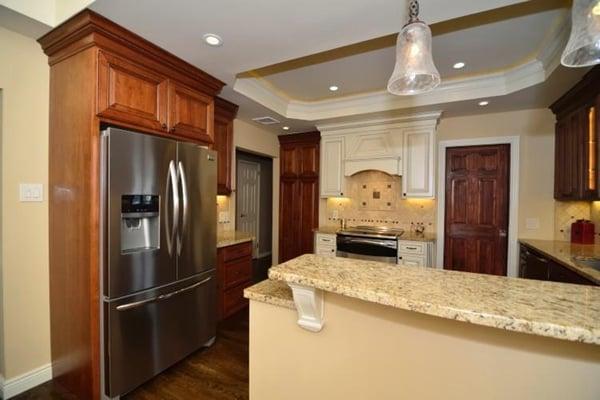 Canyon Creek Semi-custom cabinetry, tray ceiling, rope light, LED under cabinet lighting and new hardwood floors.