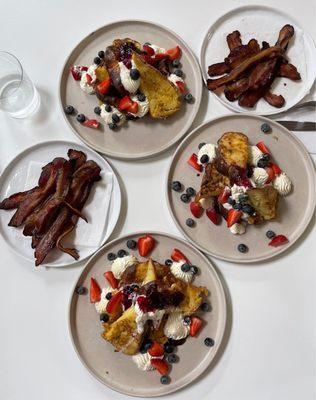 French toast with a side of bacon.