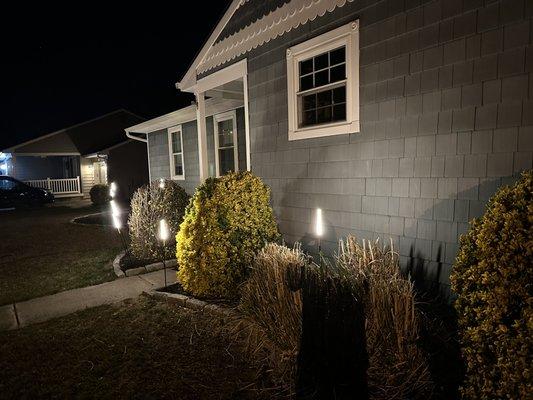 This Village Green client in Cape May chose whimsical landscape lighting to accent their home.