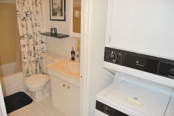 The washer/dryer & bathroom