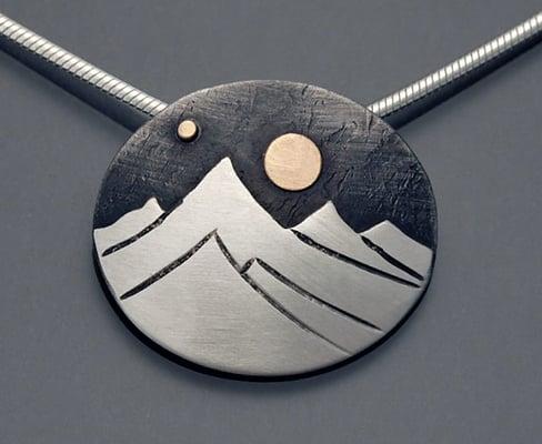 Silver and gold Mountain necklace by Matt Firth