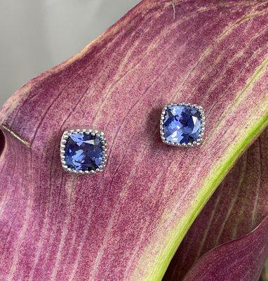 Square cushion cut tanzanites micro-prong set in 14K white gold, by Ellie Thompson