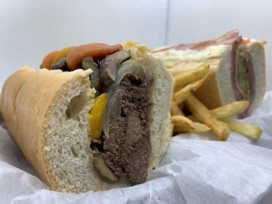 Cheese steak, Italian sub, and fries.