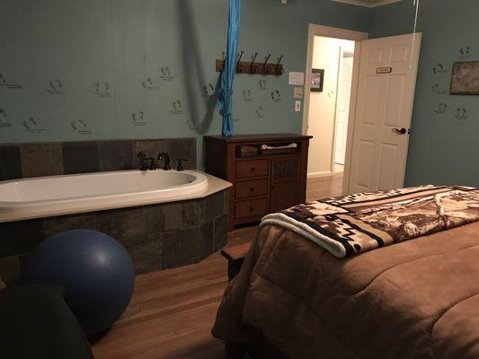 This is the Katie Louella room with the birthing tub in the room.