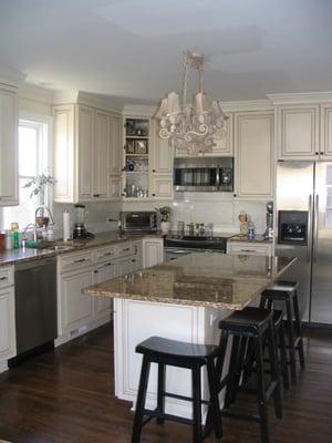 Kitchen renovation added more space and an island to entertain the family.