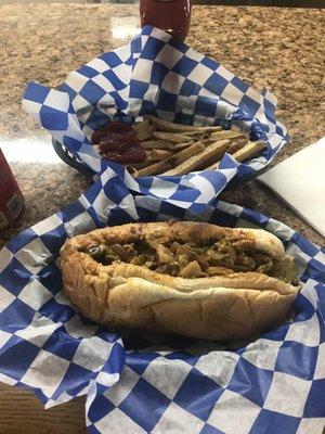 Delicious Smoked cheesesteak and fresh cut fries.