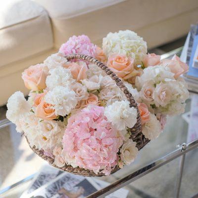 Flirty Floral Basket with roses, bush roses, and pink hydrangea.