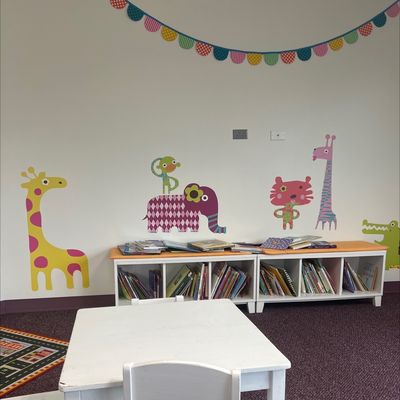 Waiting room with lots of kids books.