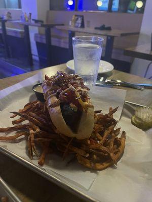 Andouille sausage, peppers, onions on a hoagie roll served with sweet potato fries the way my husbands likes them (well done)