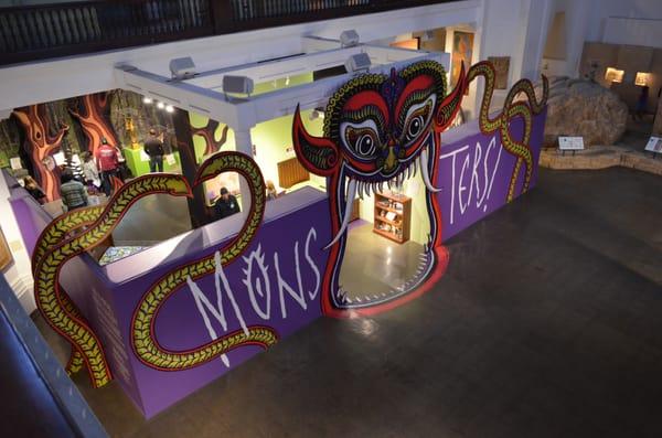 Museum exhibit "monster" printed directly on brushed steal dibond topped off with a floor graphic to complete the entrance!