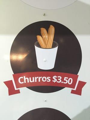 Churros with sugar and cinnamon. With a variety of dips to go with it.