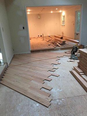 Flooring install in progress.