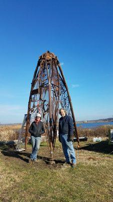 Artists Amy & John Wilkinson in front of their sculpture 'Opus in Three Movements'