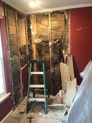 Work on repairing the damaged wall.